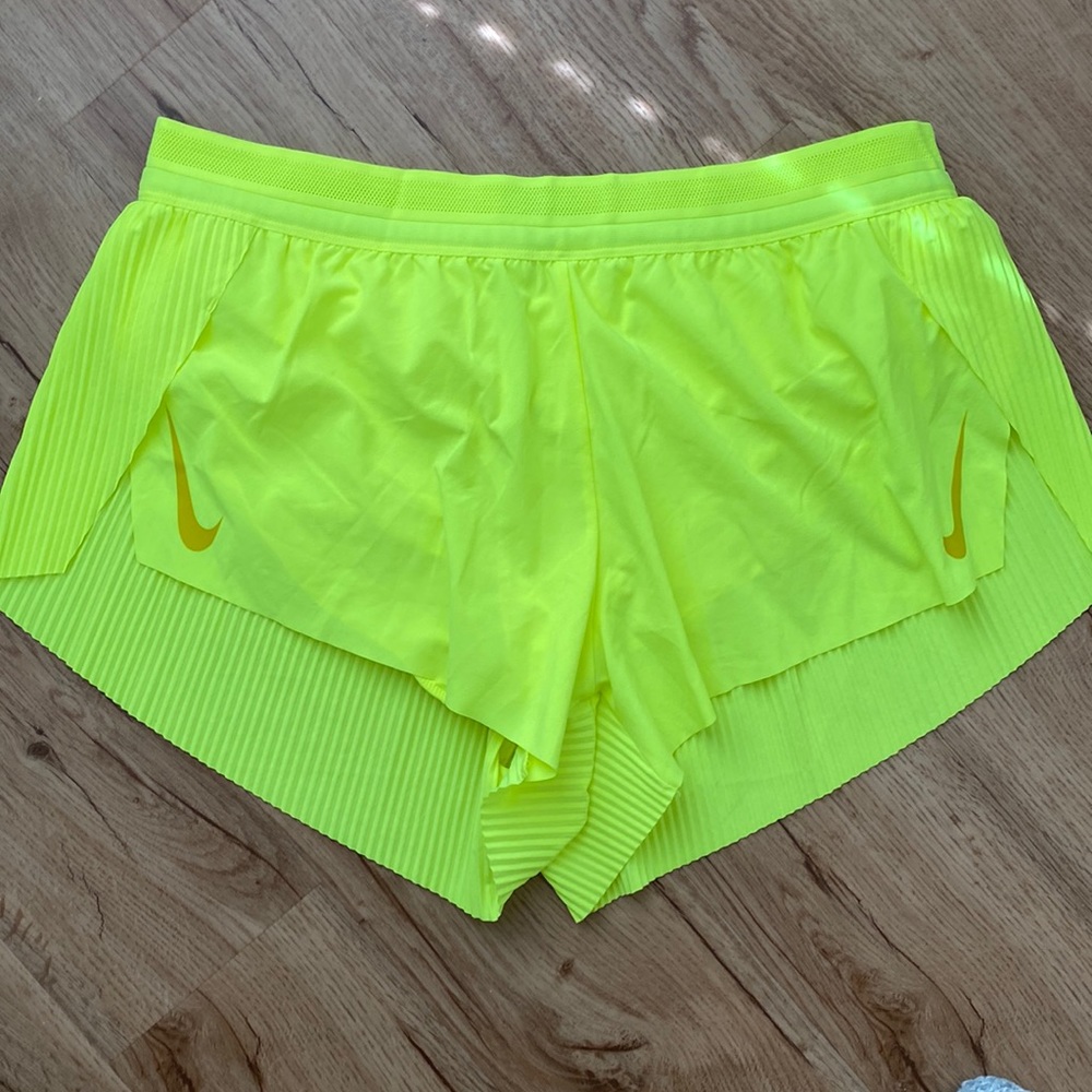 Nike highlighter yellow running shorts